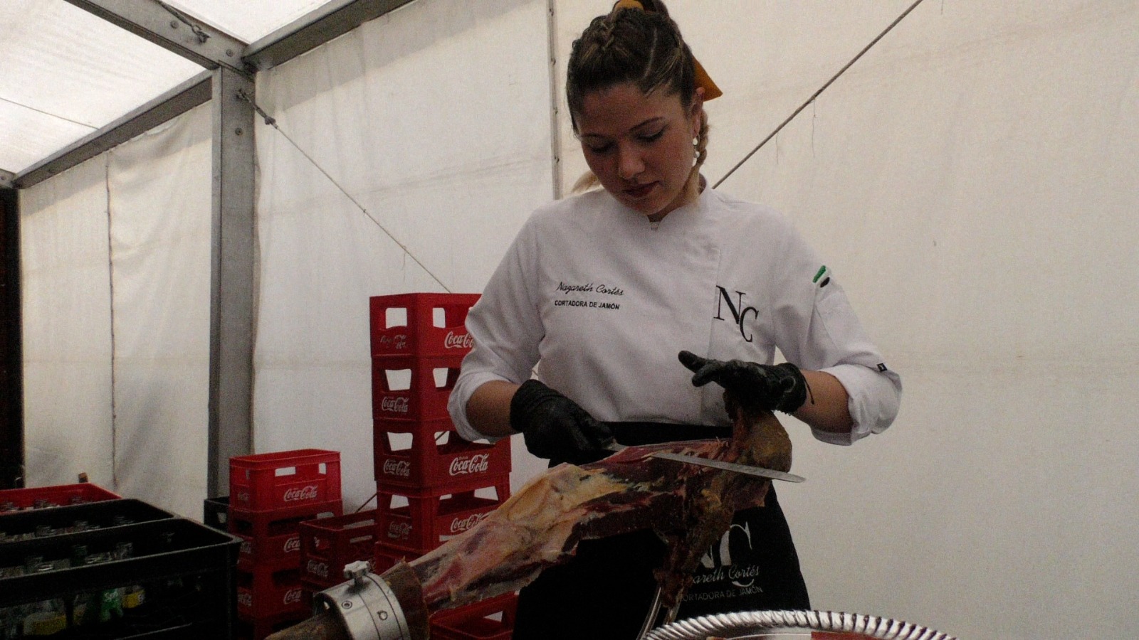 NC cortando jamon feria haba