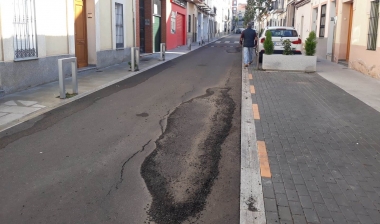 calle italia en mal estado